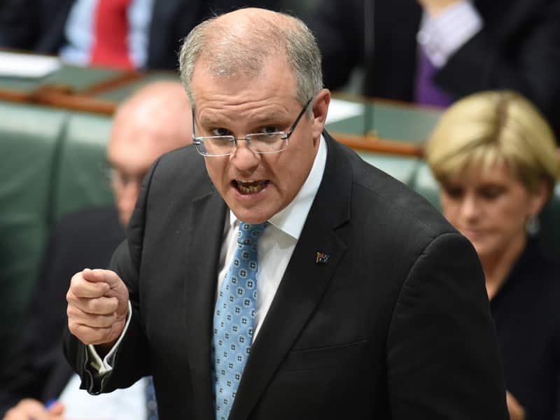 Immigration minister Scott Morrison making a point at the despatch box during question time in the house of representatives in parliament house, Canberra, Wednesday, Oct. 29, 2014. (AAP Image/Lukas Coch) NO ARCHIVING
