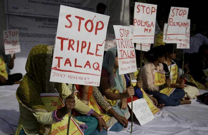 Activists of various social organisations hold placards during a protest against "Triple Talaq", a divorce practice prevalent among Muslims in New Delhi, India, Wednesday, May 10, 2017