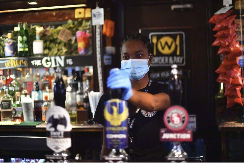 Pubs reopen across England.