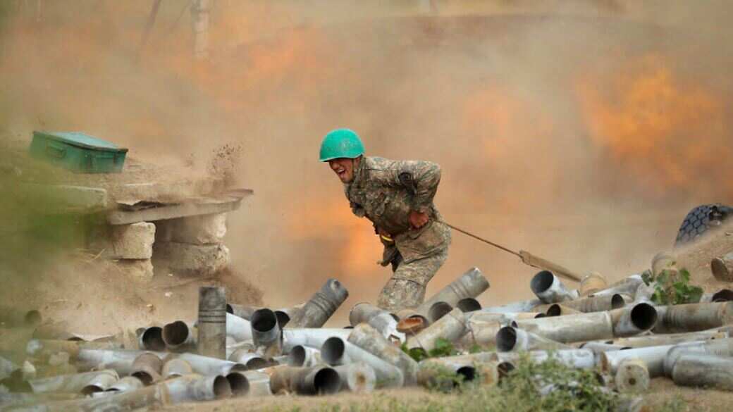 An Armenian serviceman fires a cannon towards Azerbaijan positions in the self-proclaimed Republic of Nagorno-Karabakh, Azerbaijan, 29 September, 2020.