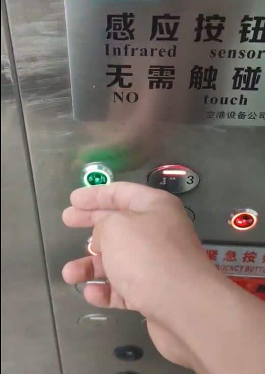 A lift with infrared sensors at Baiyun airport in Guangzhou.