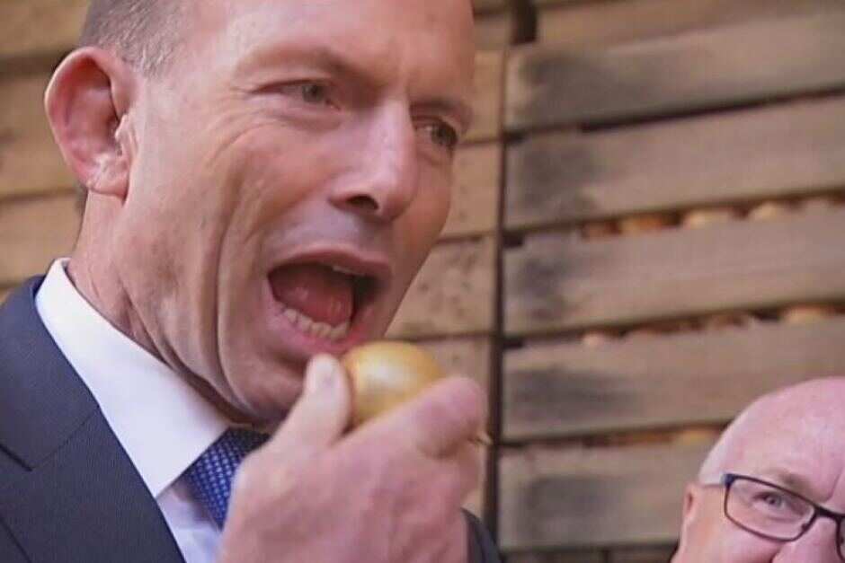 Tony Abbott shocked many Australians by eating a raw onion.