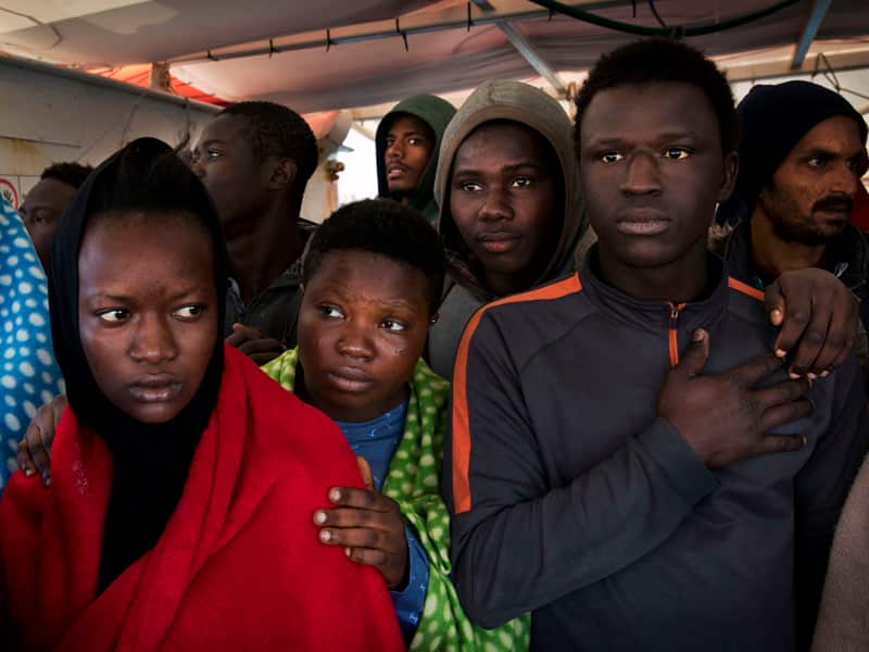 Migrants aboard the Golfo Azurro rescue vessel