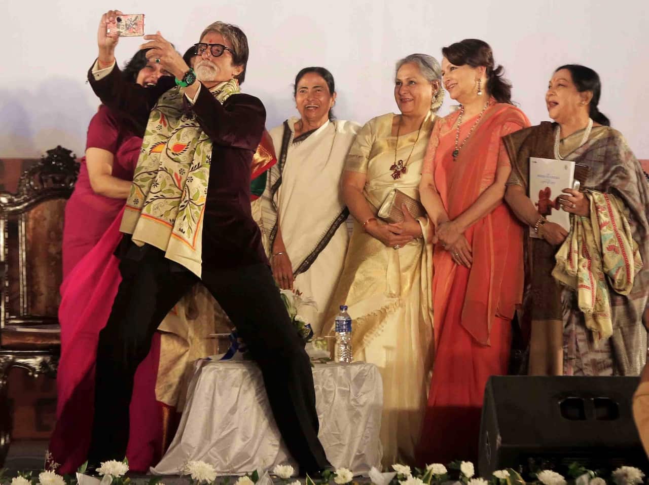 Bollywood superstar Amitabh Bachchan takes a photo during the inauguration of the Kolkata International Film Festival in Kolkata, India in 2015. 
