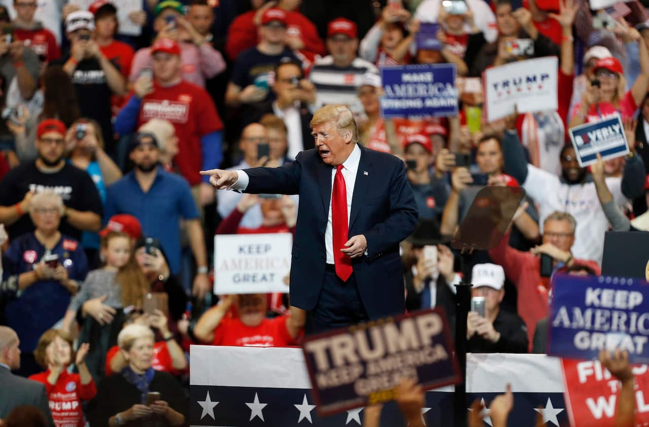 US President Donald Trump speaks to supporters during a rally in Cleveland.