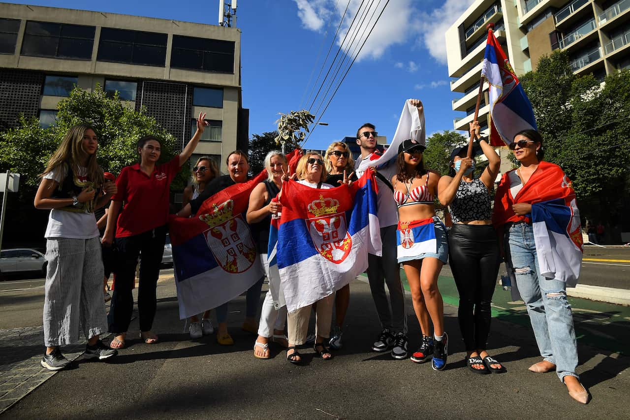 Supporters of Serbian tennis star Novak Djokovic outside Melbourne's Park Hotel, where the world No. 1 is being held in immigration detention.