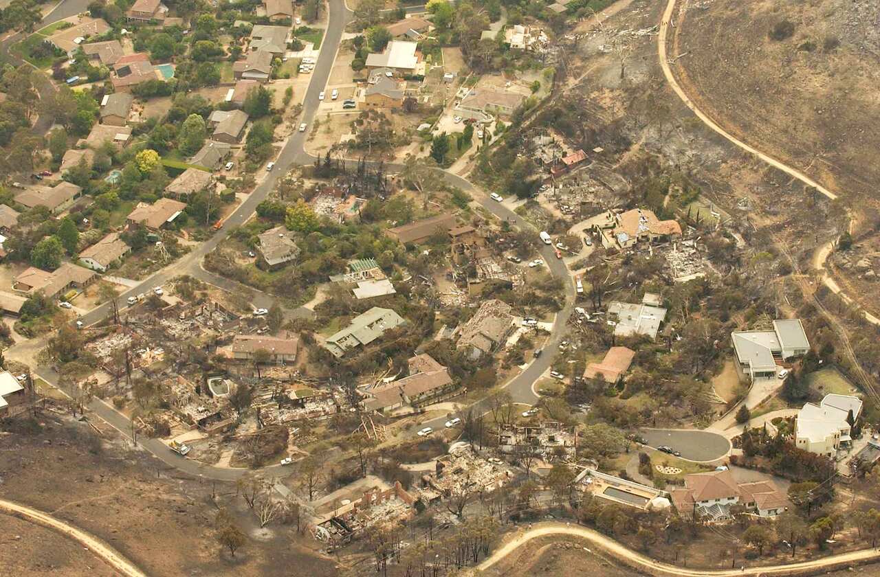 The 2003 bushfires ravaged homes in the Canberra suburbs of Chapman and Duffy.