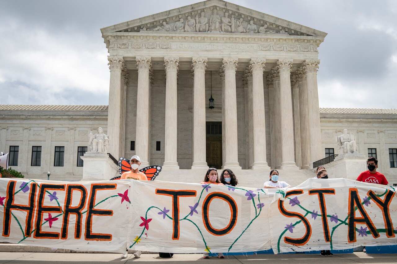 DACA recipients and their supporters rally outside the US Supreme Court.