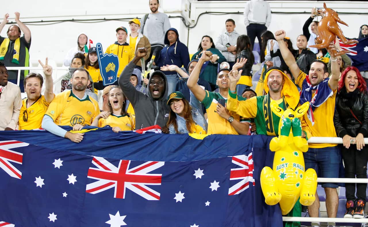 epa07306987 Fans of Australai celebrate after winning the 2019 AFC Asian Cup round of 16 soccer match between Australia and Uzbekistan in Al Ain, United Arab Emirates on 21 January 2019. EPA/ALI HAIDER