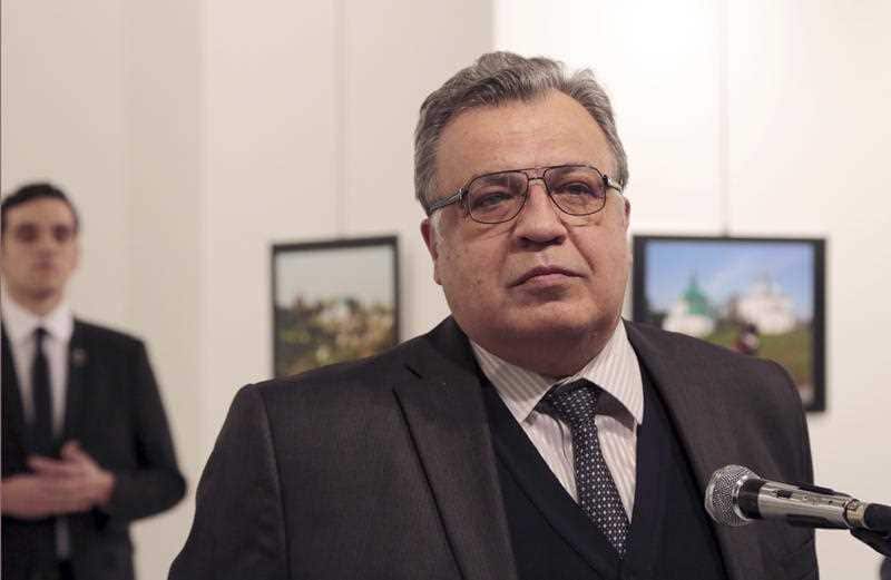 Andrei Karlov, the Russian Ambassador to Turkey, speaks at a photo exhibition in Ankara on Monday, Dec. 19, 2016, moments before a gunman opened fire on him.