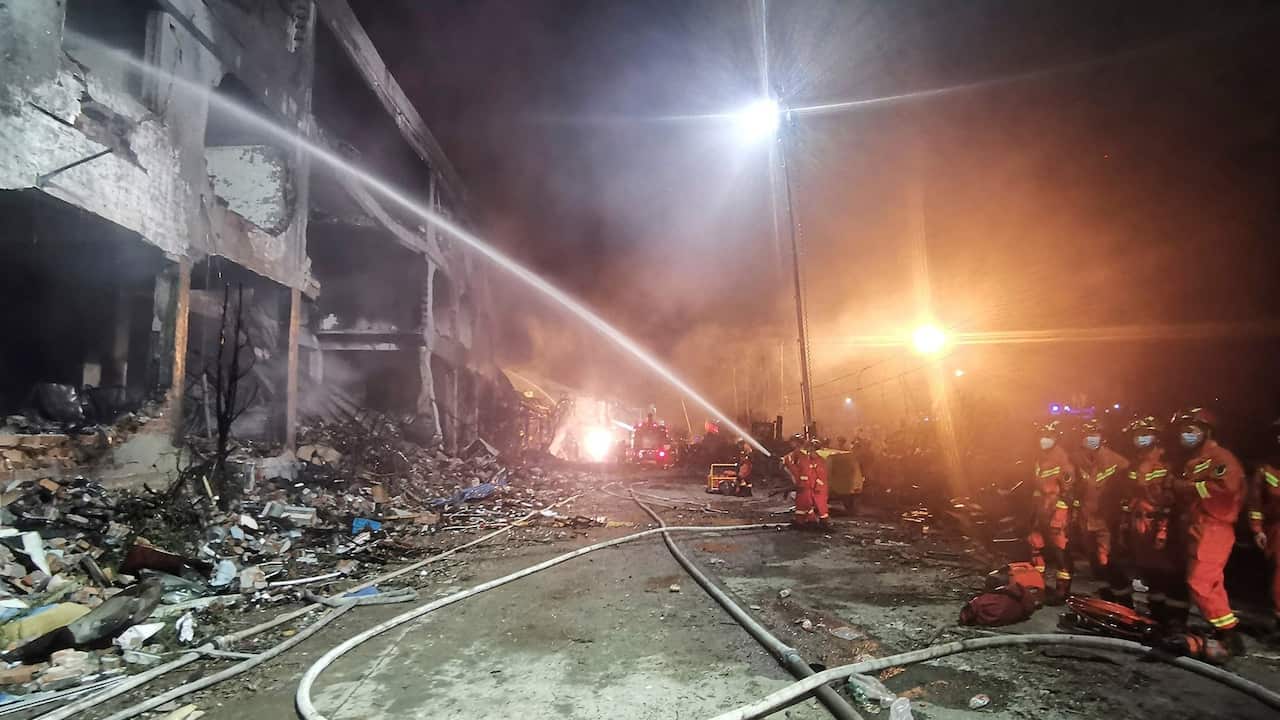 Rescue workers searched for people trapped in buildings after a truck carrying liquefied gas exploded on a highway near Wenling, China.
