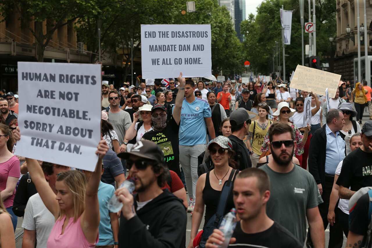 Protesters are seen during a rally against the state government's proposed pandemic laws, in Melbourne, Saturday, November 6, 2021. 