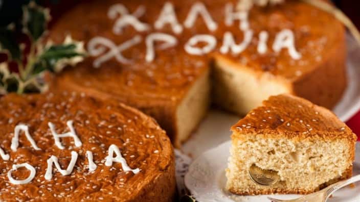 In Greece, families bake a special New Year’s Day Cake (vasilopita) and place a coin (flouri) inside it