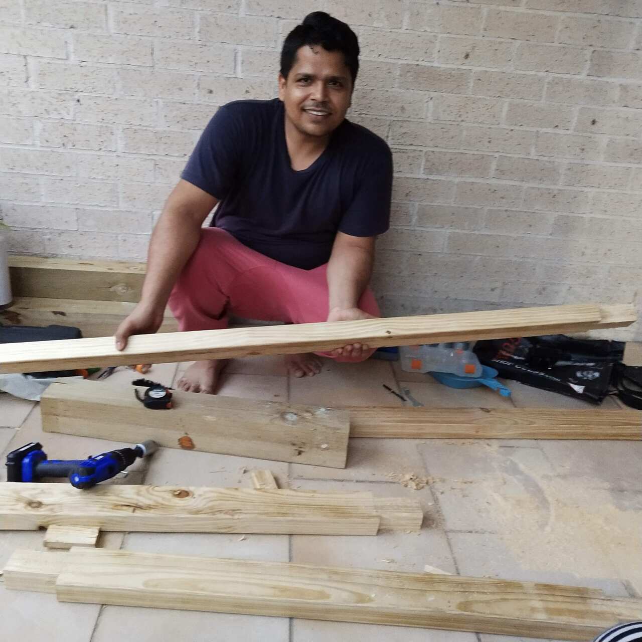 Amin Mansuri working on the frame