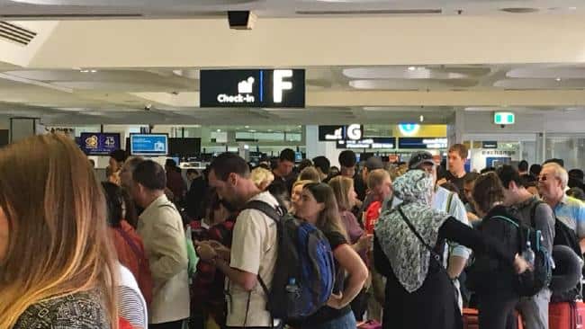 Chaos at Sydney international check-in as a passport processing system malfunction brings Australian airports to their knees. Picture: Charles Miranda