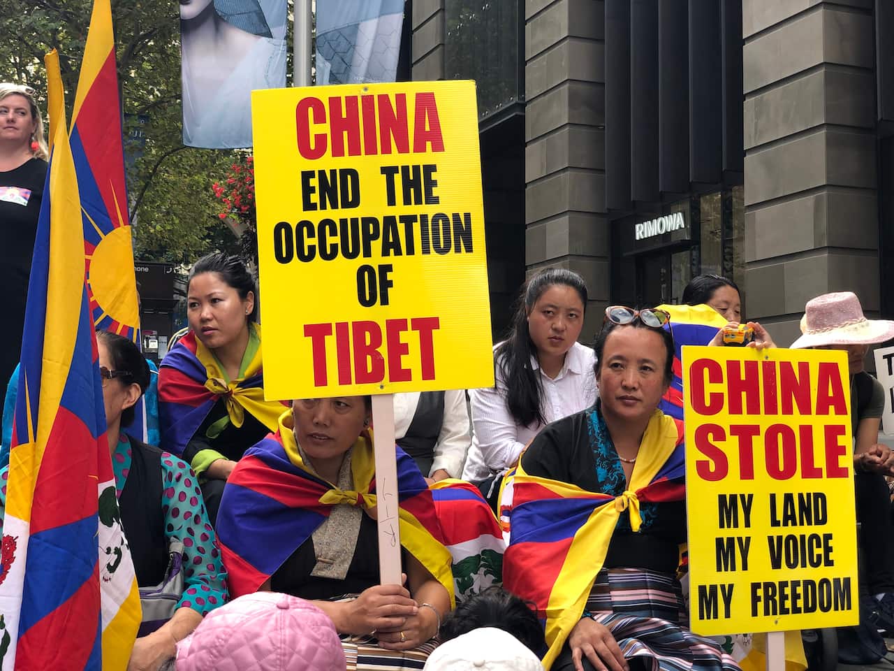 Tibetan women holding slogans