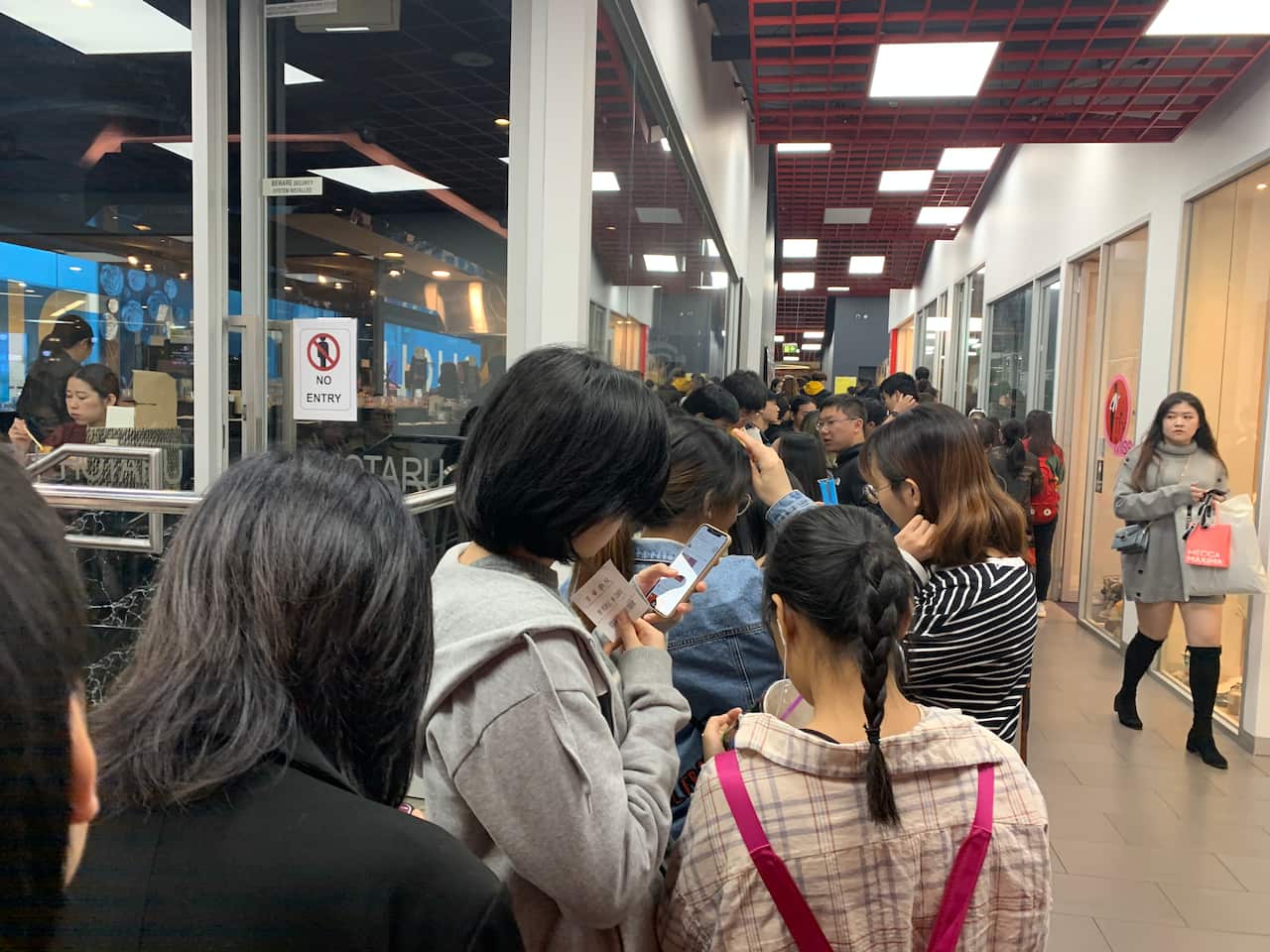 Chinese students outside China Town Cinema