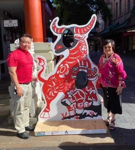 Cathy Chye Yah Chong (right) is awarded Member of the Order of Australia.