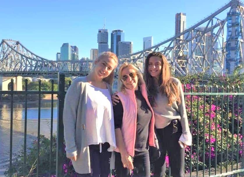 Christina Papadopoulou (R) with sister Eleni Papadopoulou (R) and mother Alexandra Mantzouki (M) in Brisbane, Queensland, Australia.
