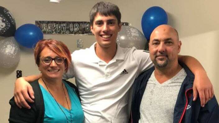 Christopher Cassaniti and his parents.