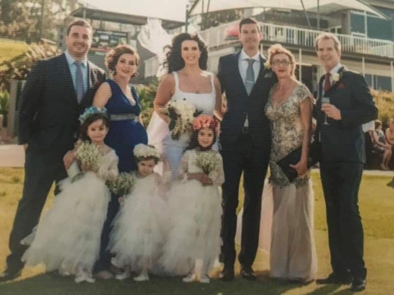 A portrait of Rosadi family on their daughter's Annalisa wedding day.