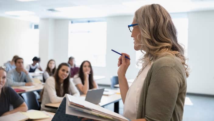 Professor leading lesson in classroom