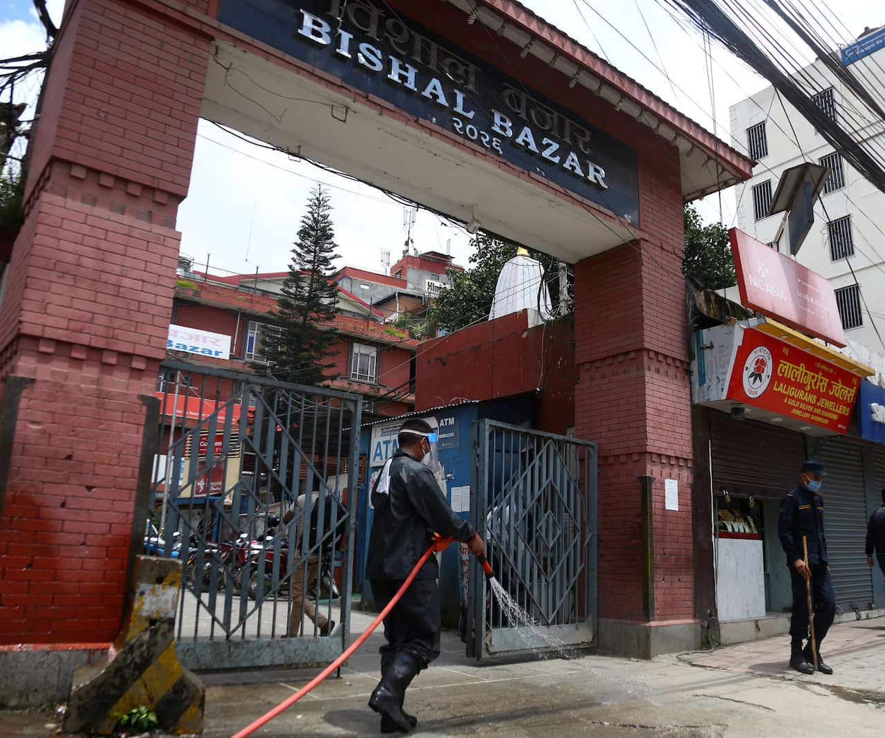 Cleaning outside Kathmandu shopping mall