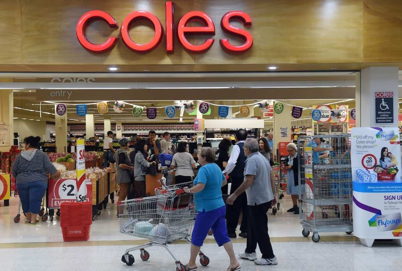Shoppers queuing at the registers at a Coles supermarket in Sydney 