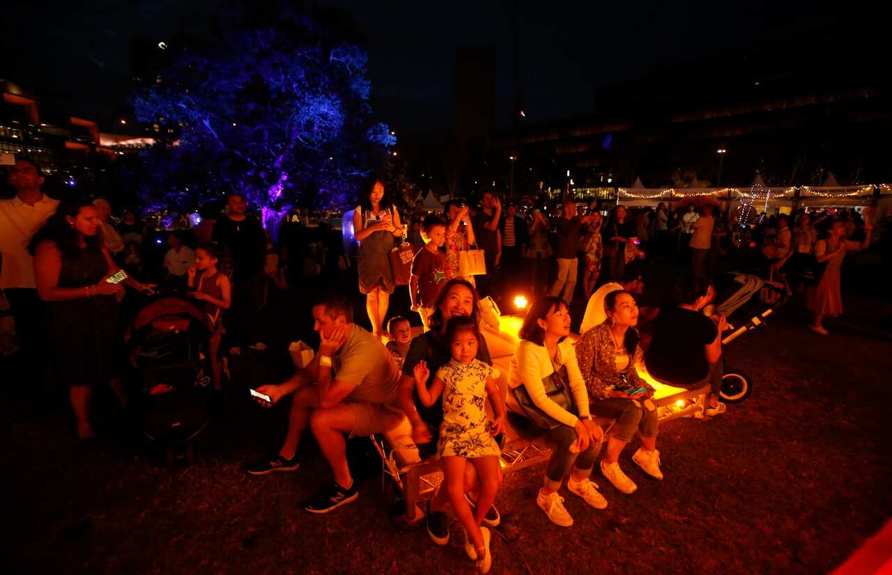 People admire displays at the Chinese New Year Lantern Festival in Tumbling Park in Darling Harbour