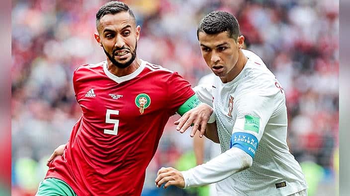 Cristiano Ronaldo of Portugal disputes as Dirar from Morocco during the match at the Lujniki stage during the 2018 World Cup championship. 