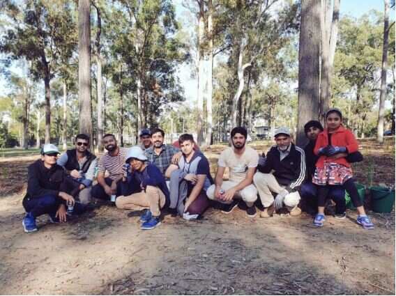 Australia's young Ahmadiyya Muslims help plant trees at an event last month. Twitter/MuslimYouthAU
