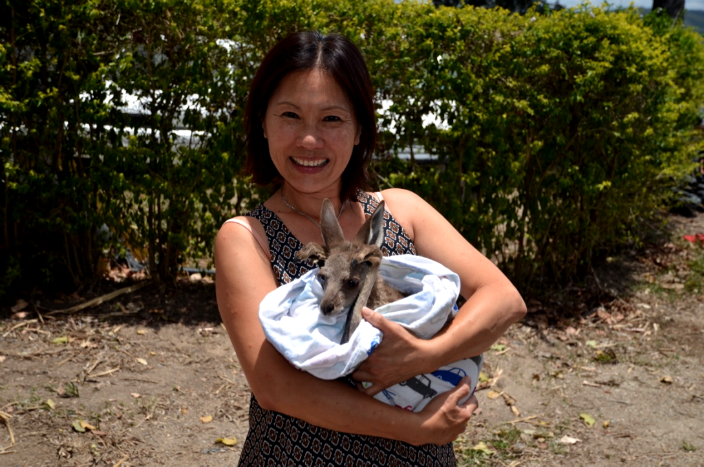Diem Dang with baby kangaroo