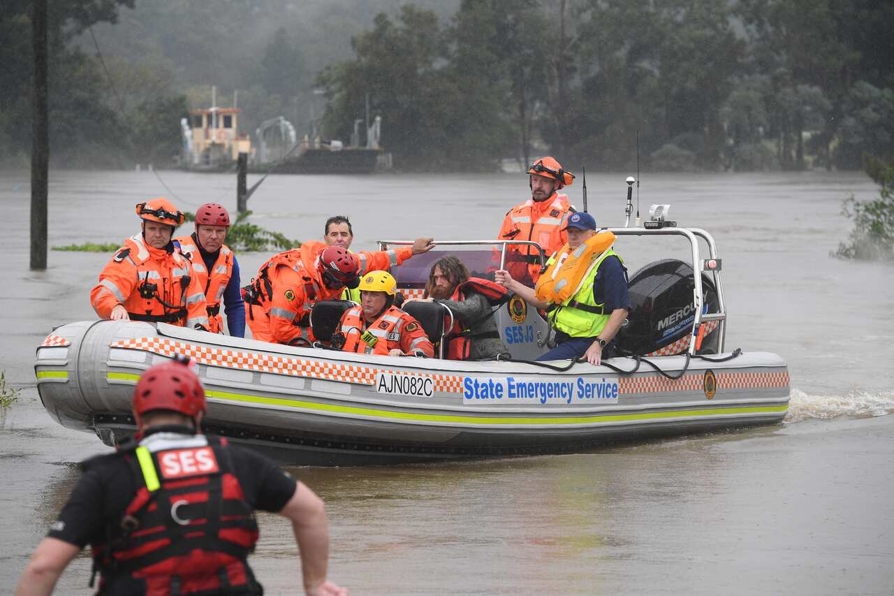 A family of four whose rescue boat capsized during their evacuation from a flooded property at Upper Colo in north western Sydney on 23 March, 2021.