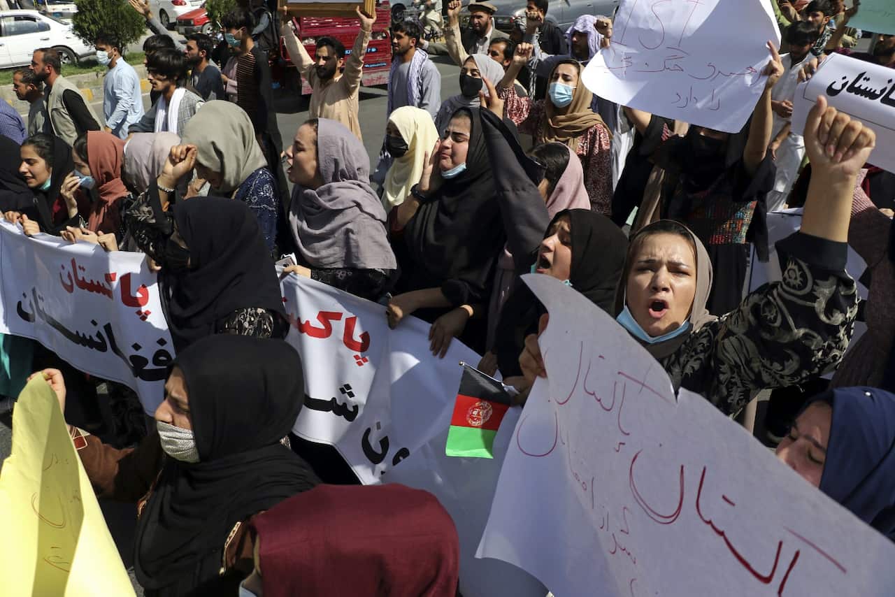 Afghan women shout slogans during a rally near the Pakistan embassy in Kabul on 7 September 2021.