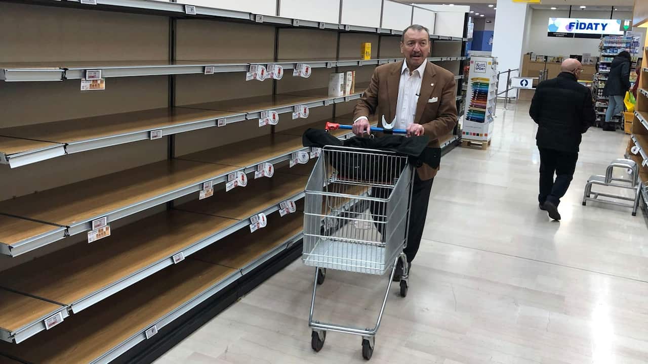 Empty shelves at supermarket as people stockpile due to the fear of the new coronavirus, in Pioltello near Milan, Italy, 24 February 2020. 