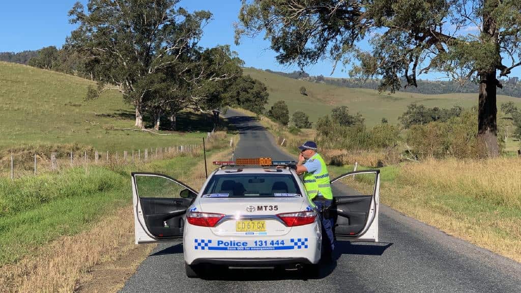 Police search for the shooter at Bingleburra near Dungog.