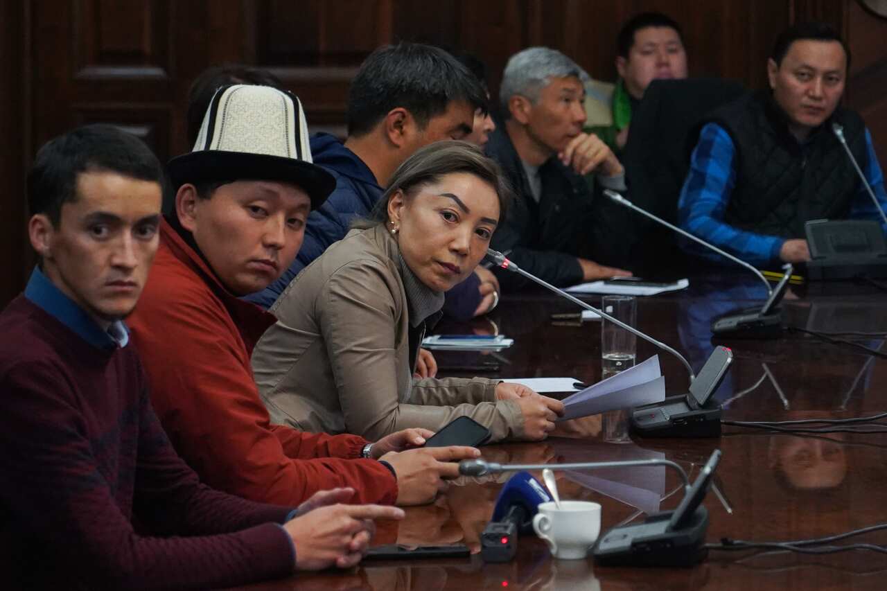 Attendees during a meeting of the People's Coordination Council at the White House on 7 October.