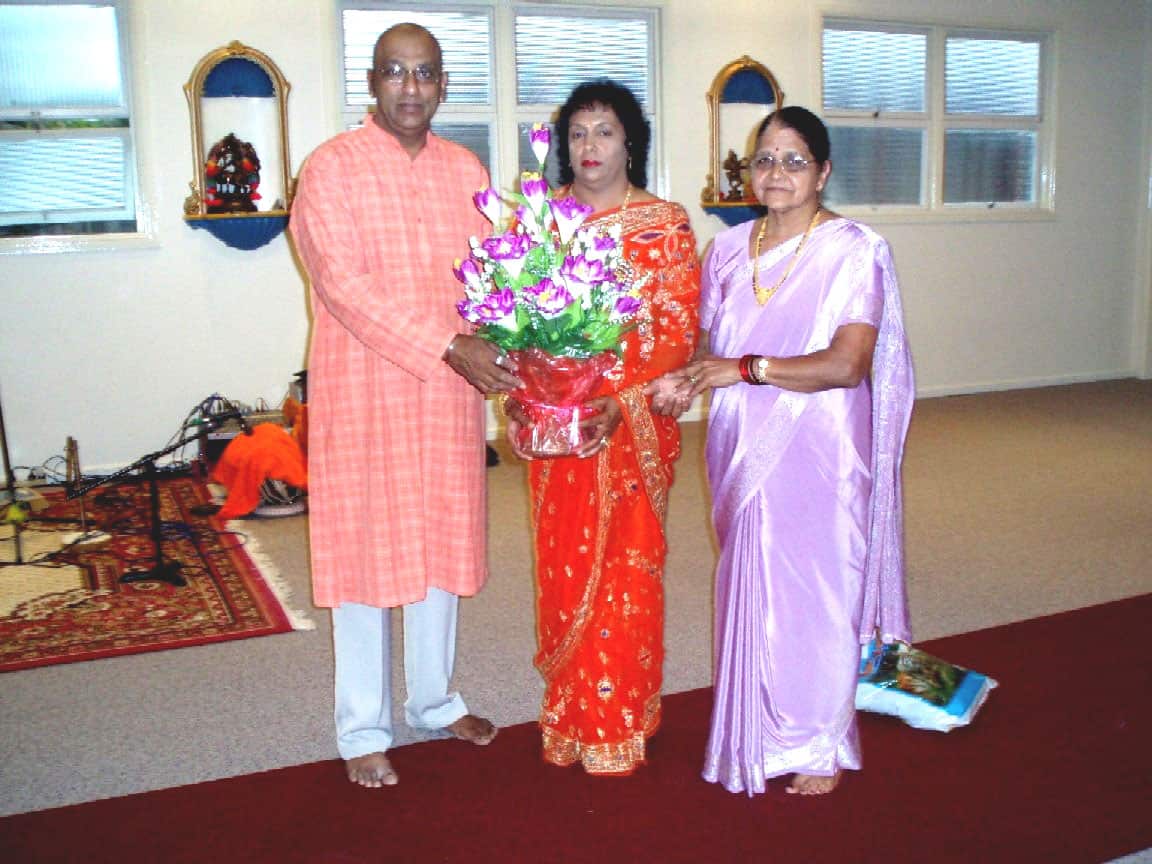 Umesh and his wife Usha (c) when the temple opened.
