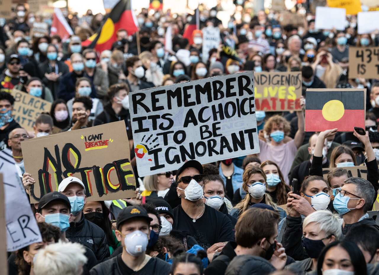 Protesters participate in a Black Lives Matter rally in Sydney last weekend.