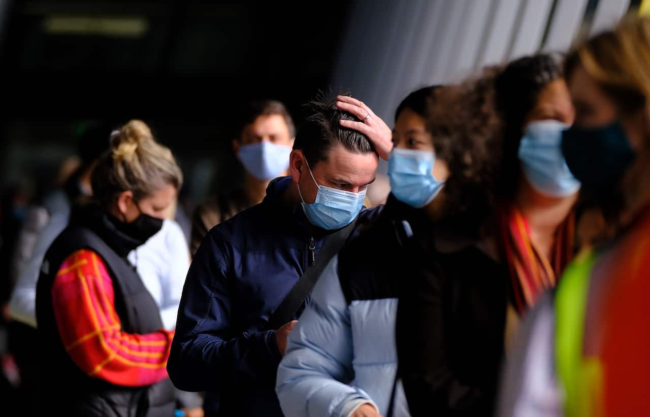 People line up to be vaccinated at a mass coronavirus vaccination hub at the Melbourne Convention and Exhibition Centre.