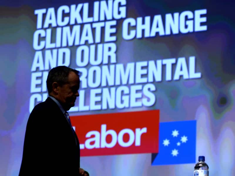 Bill Shorten waves after speaking on climate change