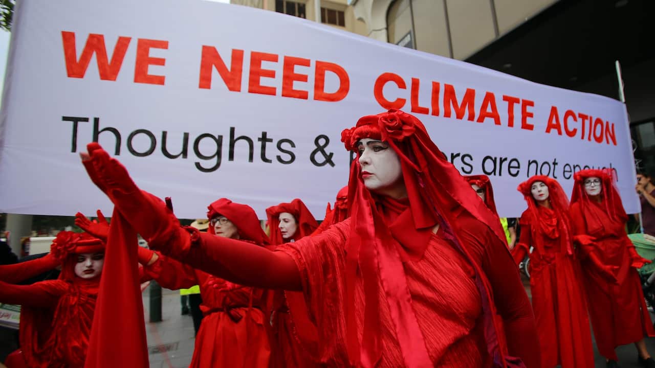 Red Rebels from Extinction Rebellion at the protest in Sydney.