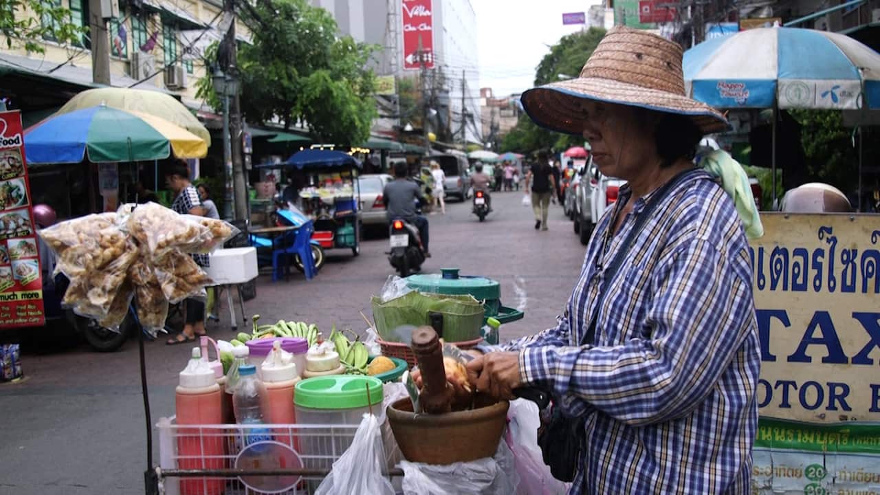 Saiyon Panya has been selling papaya salad from a food cart for two decades. She's recently been asked to leave the area where her shop is based.