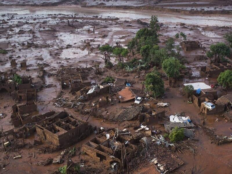 A file image of homes laying in ruins after mine dams burst in Brazil.