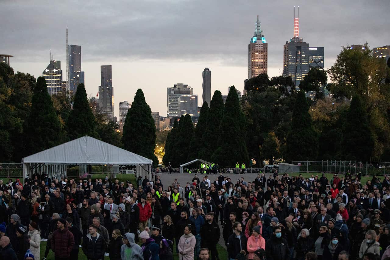 People gather for the Anzac Day Dawn Service at the Shrine of Remembrance in Melbourne.