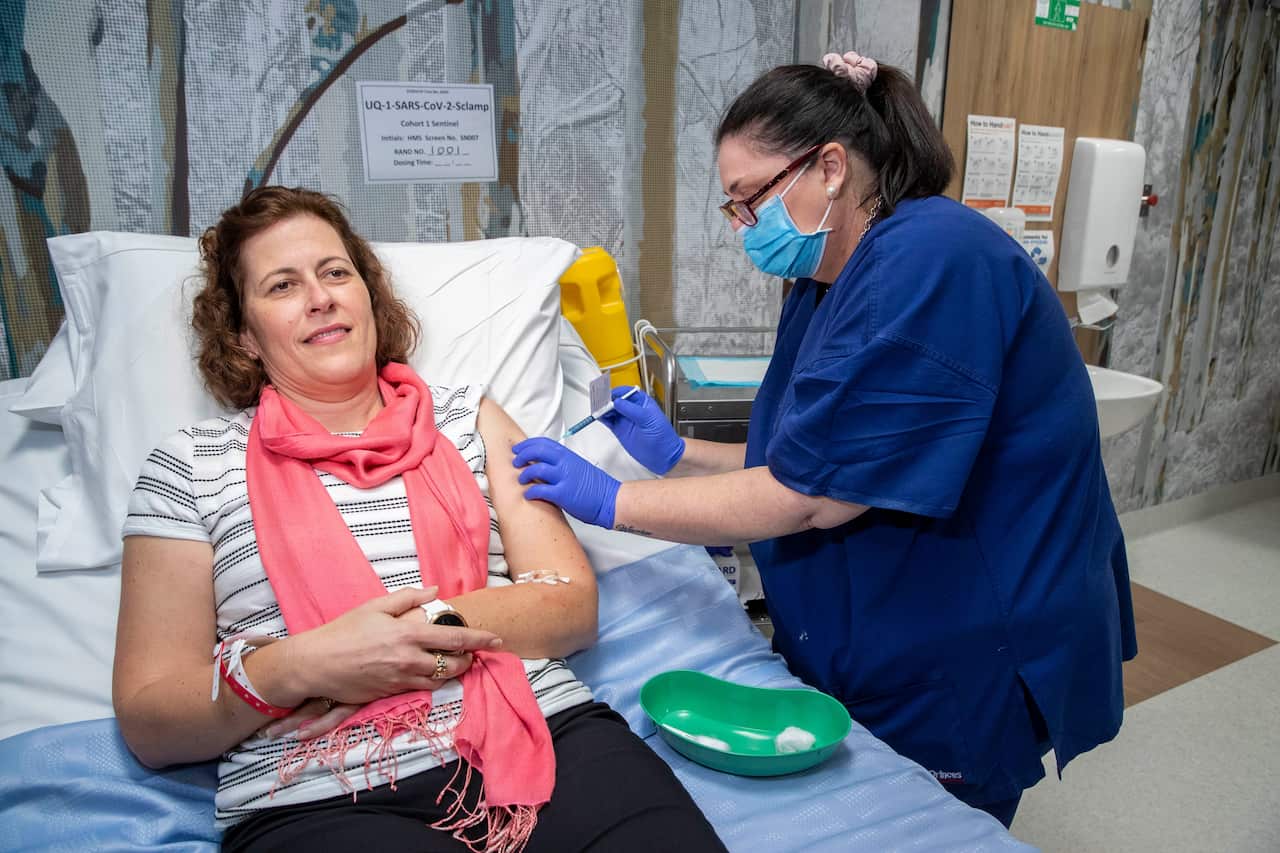 A volunteer is seen during a coronavirus vaccine development announcement in Brisbane, Monday, July 13, 2020. 