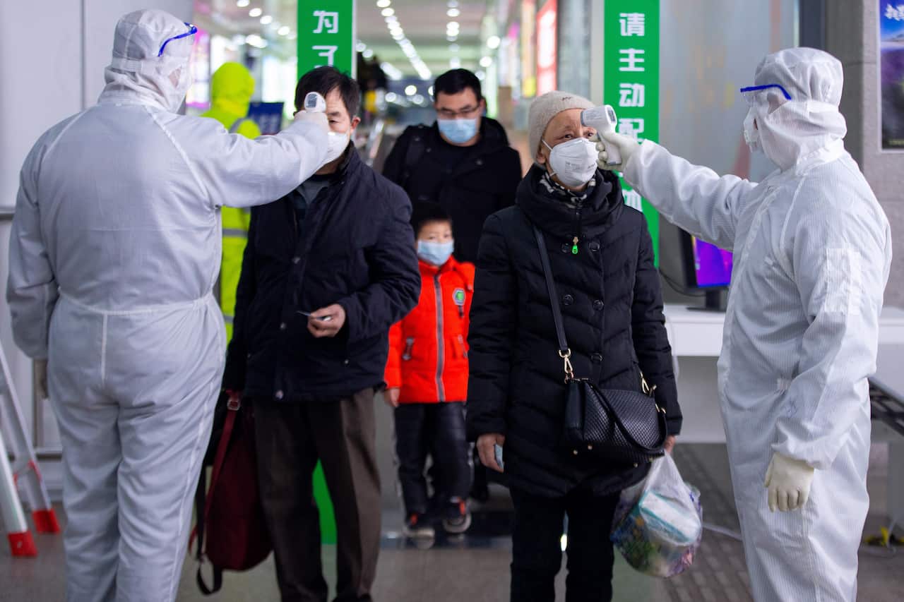 People back to work at the last day of spring festival travel season during the novel coronavirus pneumonia epidemic period in Nanjing, Jiangsu, China.