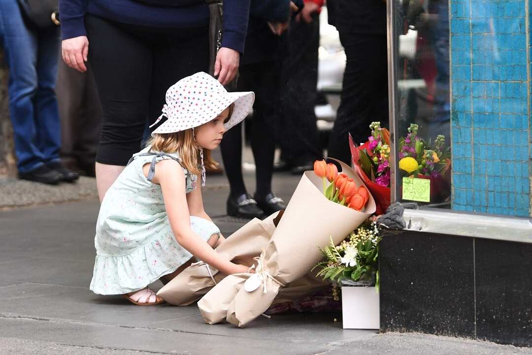 Mourners pay their respects to Sisto Malaspina, the co-owner of Pellegrini's Espresso Bar.