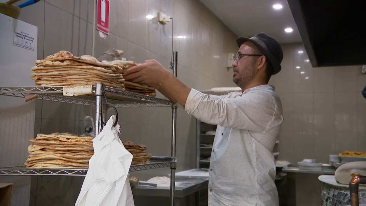 Salim Deeni making traditional Afghan bread at his restaurant Afghan Sufra