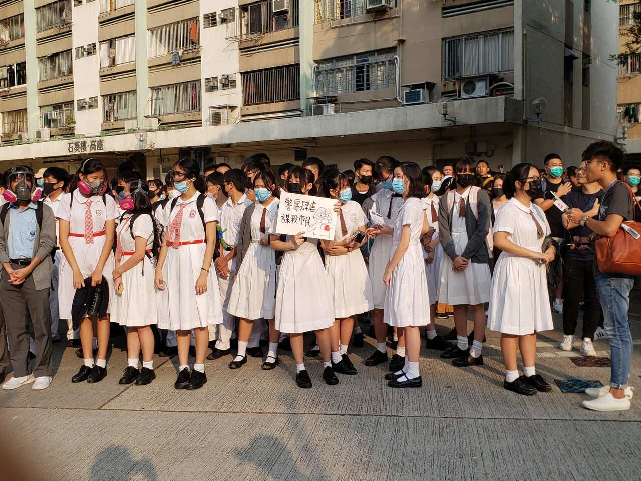Hong Kong school students joined in on the sit-in. 